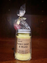 Load image into Gallery viewer, Image shows a plastic jar with silver screw top containing yellow sherbet. the jar sits in a cellophane wrapper with a pink lollipop next to it with a kraft label saying Fairy Dust & Wand.
