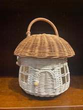 Load image into Gallery viewer, Rattan fairy house basket shown with brown handle on roof/lid. Basket has windows and a door with bead fastening.