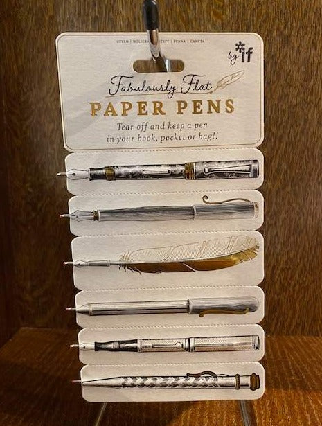 A set of paper encased biro pens decorated with with gold foiled black and white illustrations of various pens and quills. Pens tear off for use.