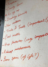 Load image into Gallery viewer, A parchment paper list completed in the shimmering orange and gold ink found inside a tin of Joyful Hygge.
