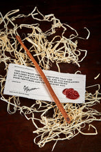 Load image into Gallery viewer, Image of a large handmade advanced wand, wooden decorative wand stamped with a black Grimm & Co 'G' monogram at the base of the handle. Wand has three dots of sterling silver at the tip, wand wood is a rich brown colour and comes with a wax sealed certificate of authenticity