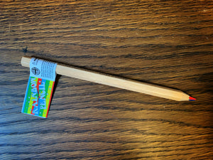 Image shows a downward view of a Rainbow Word Wand. A light brown wooden pencil, with multicoloured lead. In this image, the two colours in view are red and blue.