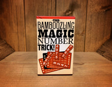 Load image into Gallery viewer, Image shows the front of the box for the Magic Number Trick. It has an illustration showing the parts of the trick included.