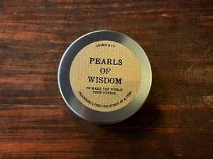 Image is a top down view of a tin of Pearls of Wisdom, showing the kraft sticker label with the name.