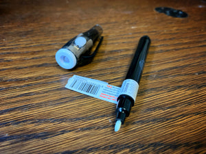 Image shows a close up view of the Invisible Ink Pen with the lid removed and the UV light switched off.