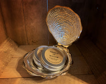 Load image into Gallery viewer, Image shows two tins of Pearls of Wisdom sitting on a silver clam shell.
