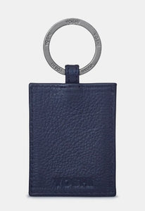 Image shows the back of the navy blue leather Austen keyring with metal ring stamped with YOSHI branding. The bottom of the leather is embossed with YOSHI.