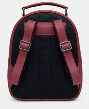 Load image into Gallery viewer, Image shows the cherry red leather backpack with adjustable shoulder straps, carry handle and black padded back for added comfort.