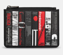 Load image into Gallery viewer, Image shows a black leather zip top purse with appliqued design of classic horror themed book spines in shades of black, grey and red.