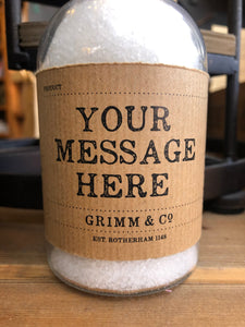 Image showing a close up of a kraft label on a potion bottle. Label reads: Your Message Here.