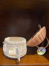 Load image into Gallery viewer, Rattan basket in the shape of a fairy toadstool house, shown with roof/lid lifted and door open.