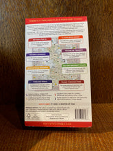 Load image into Gallery viewer, Image shows the back of a folded map of the UK with colour coded locations featuring trivia, museums and festivals and historical events in the History map.