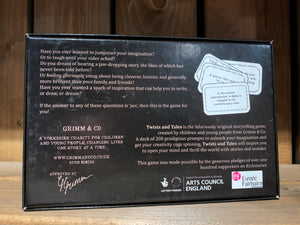 Image of the back of the box for Twists and Tales, a storytelling game created by children and young people at Grimm and Co. The box is dark blue with white text and has an illustration in the upper right corner of some of the card types within.