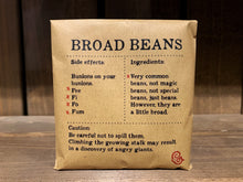 Load image into Gallery viewer, Image shows a packet of Broad Beans. It is a square, kraft brown paper packet., with black text printed in Appareo font. It says Broad Beans at the top, with magical ingredients and side effects printed underneath, and a magical &#39;caution&#39; at the bottom.