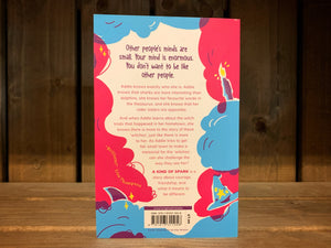 Image of the back cover for A Kind of Spark. The red and blue hair illustration borders the cover, with illustrations of a shark, a witch hat, and a candle. The blurb is written in the middle, in red and purple text on a cream background. 