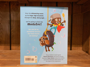 Image shows the back cover of We're Going to Find the Monster. The background is two types of pale blue, and has an illustration of the two boys from the front playing with a tyre swing. The blub is written in black and white text.