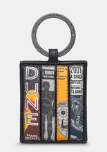 Load image into Gallery viewer, Image shows a black leather keyring with metal ring stamped with YOSHI. Keyring features 4 appliqued book spines of sci-fi classics including Dune, I, Robot, Do Androids Dream of Electric Sheep and 2001: A Space Odyssey.