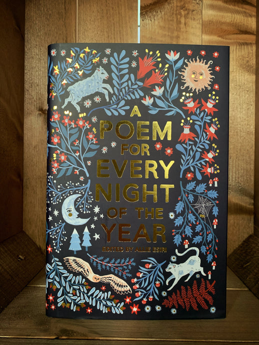 Image shows the front of the hardback book, A Poem for Every Night of the Year. The cover is navy blue, with foiled gold lettering for the title, and features illustrations in shades of blue and red of flowers, trees, the moon and sun, and a sheep, an owl, and a cat.