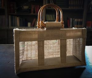 Image of a triple window jute gift bag with bamboo handles, to fit three smaller items side by side, such as potion bottles