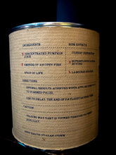 Load image into Gallery viewer, Image shows the kraft wrapped Joyful Hygge tin with the faux ingredients and side effects listed on the back.