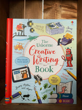 Load image into Gallery viewer, Image of the front cover of The Creative Writing Book. The cover has a pale blue and lined background with a red spine. There are illustrations of various objects and scenes related to forms of creative writing, including a newspaper, and a man filming with a camera under studio lights. There are small amounts of text around the images explaining what the book can help with, including tips for script writing, speech writing, and short stories.