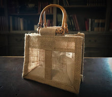 Load image into Gallery viewer, Image of a double window jute gift bag with bamboo handles, to fit two smaller items side by side, such as potion bottles