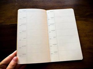 Image showing the inside of the calendar refill on pages showing the days of the week, with space for notes.