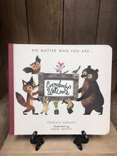 Load image into Gallery viewer, Image of the board book Everybody&#39;s Welcome by Patricia Hegarty with cut-outs and stylized animals on the cover/ Illustrations by Greg Abbott.