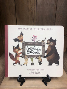 Image of the board book Everybody's Welcome by Patricia Hegarty with cut-outs and stylized animals on the cover/ Illustrations by Greg Abbott.