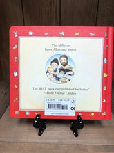 Load image into Gallery viewer, Image of the back cover of Peepo! board book. Back illustration is a self portrait of author/illustrators Janet and Allan Ahlberg with their daughter Jessica. 