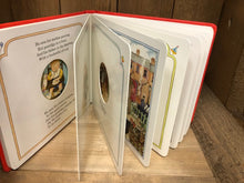 Load image into Gallery viewer, Image of Peepo! board book with pages fanned open to show some illustrations and cut outs from each page.