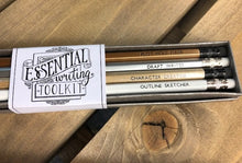 Load image into Gallery viewer, Image shows the Essential Writing Toolkit set of Word Wands in neutral colours of bronze, silver, pale wood and white. Slogans at end near erasers printed in black ink and read, Plot Hole Fixer Draft Writer Character Creator Outline Sketcher.