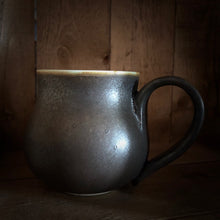 Load image into Gallery viewer, Image of a Travel Cauldron, more commonly known as mugs in the mortal realm, ceramic and dyed a rich copper to black colour, each one is unique and handmade. The regular sized mug has the Grimm &amp; Co &#39;G&#39; monogram stamped into the base of the handle. 