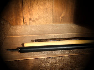 Image of all three colours of Dip Wands available in matte black, natural pale wood and glossy nut brown. Dip Wand is a wooden dip pen with nib for use with writing or drawing inks