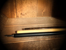 Load image into Gallery viewer, Image of all three colours of Dip Wands available in matte black, natural pale wood and glossy nut brown. Dip Wand is a wooden dip pen with nib for use with writing or drawing inks