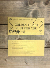Load image into Gallery viewer, Image shows the front and back of the Golden Ticket Just for You with a swirled border on the front and icons showing stars, a lucky horseshoe and a four-leaf clover. The text on the back says the following - This Golden Ticket grants the recipient one usage for the below perks, Long lie-in on a day of your choice, Blue skies and sunshine guaranteed for your day off, Uninterrupted daydream, and a space for you to write your own additional perk.