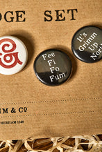 Load image into Gallery viewer, Image showing Fee Fi Fo Fum button badge on kraft card backing