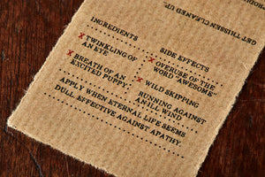 Image of the back label of Condensed Enthusiasm bar showing faux ingredients and side effects