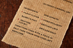 Close up image of the kraft label with the faux side effects and ingredients for Luck of the Irish