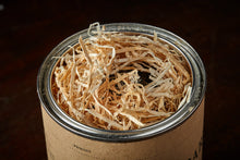 Load image into Gallery viewer, Image of Berry Sparkle opened tin to show wood wool padding inside to protect ink before use