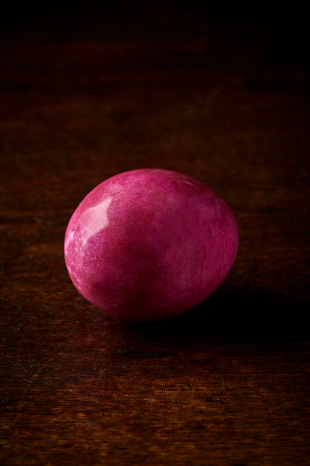 Image shows Crystallized Dragon Egg, otherwise known as a 2-3 inch pink coloured marble egg.