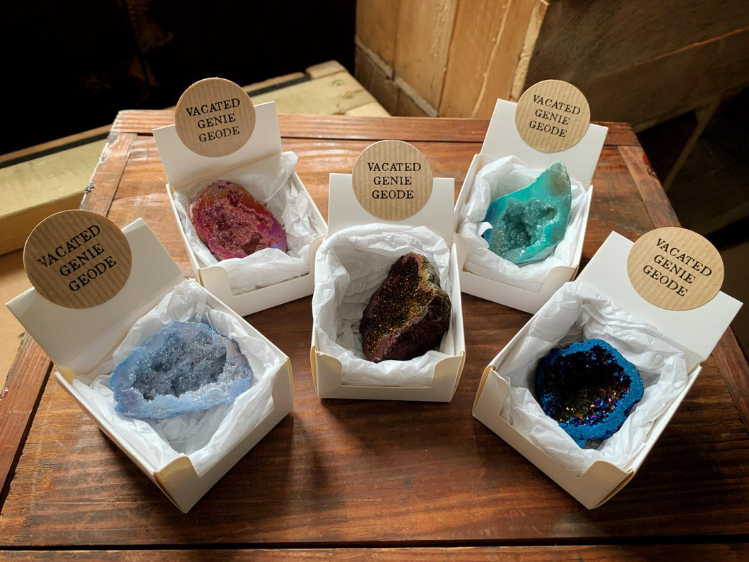 An image showing a collection of assorted colours of quartz geodes for the vacated genie geodes.