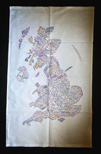Load image into Gallery viewer, Image shows the Giant Handkerchief unfolded to display design printed in purple, orange and slate grey on white cotton tea towel.  Design shows a literary map of Britain with names of famous authors shaped in and around the areas where they lived.