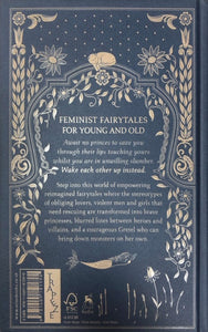 Image of the back cover of hardback book Fierce Fairy Tales & Other Stories to Stir Your Soul, book is displayed on a book stand 