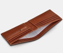 Load image into Gallery viewer, Image shows the brown Yoshi leather Shakespeare wallet pictured open to reveal the notes section across the length of the wallet, and two sides with card slots and zip coin pocket. Lining of wallet is white printed with grey YOSHI text. Outer inside corners are embossed with YOSHI and the genuine leather symbol.