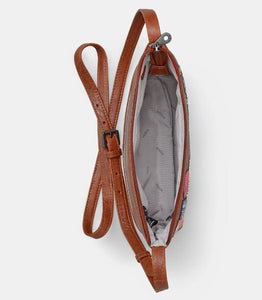 Image shows a top view of the brown Yoshi leather cross body bag with the zipper open to reveal the white cotton lining with all over grey YOSHI text.