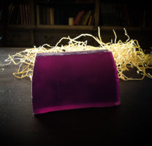 Load image into Gallery viewer, Image of a Tranquility bar, a purple solid shampoo slice shown without label