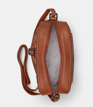 Load image into Gallery viewer, Image shows the top of the brown vegan Yoshi camera-style bag with zipper open to reveal the white lining printed with grey YOSHI text. Strap is adjustable to wear cross-body or on the shoulder.