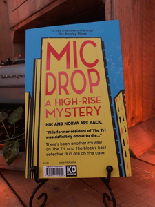 Image shows the back cover of the paperback book Mic Drop written by Sharna Jackson and part of the High Rise Mystery series.