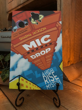 Load image into Gallery viewer, Image shows the front cover of the paperback book Mic Drop written by Sharna Jackson and part of the High Rise Mystery series.